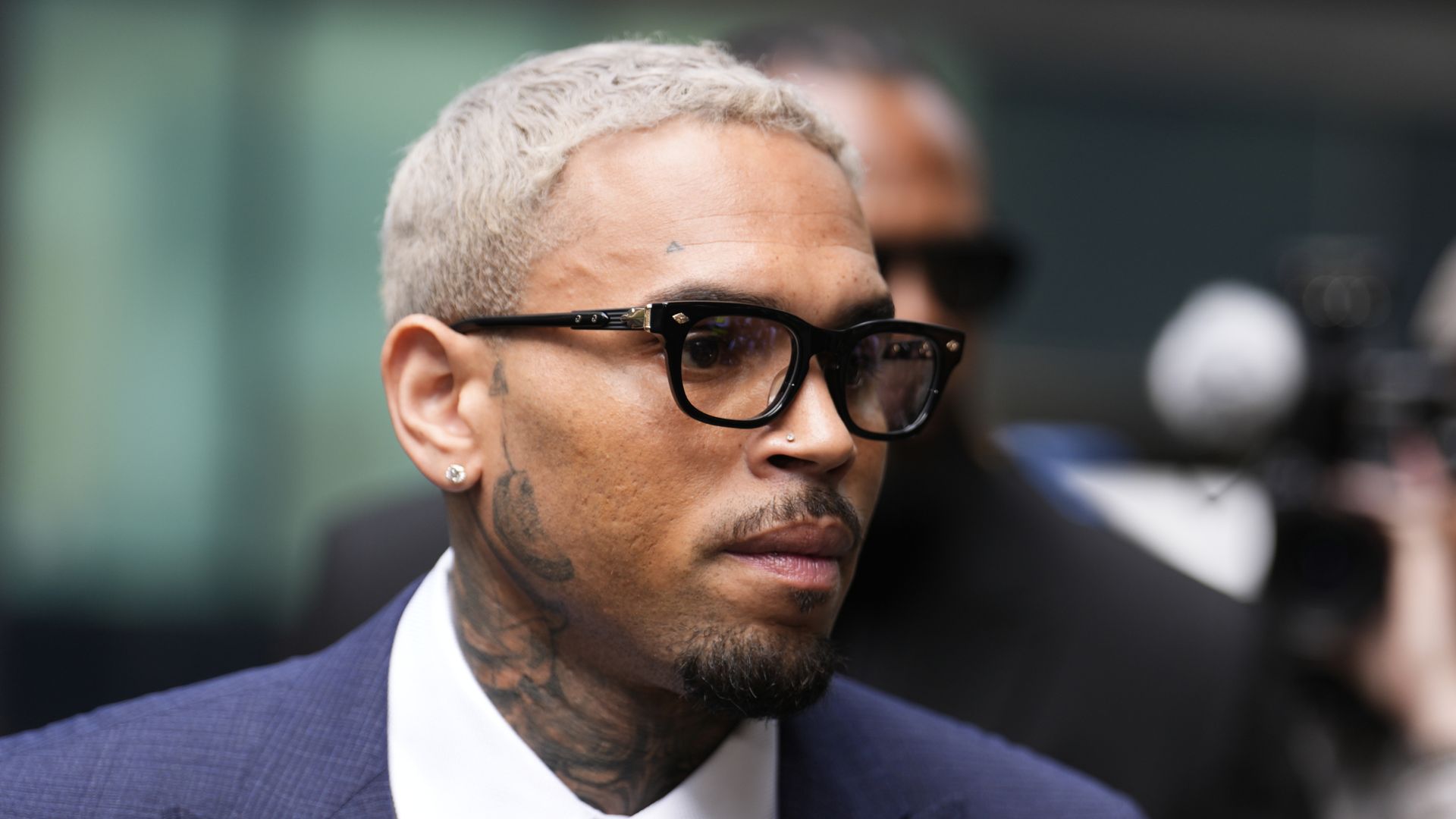 US singer Chris Brown pleads not guilty to attempting to cause GBH