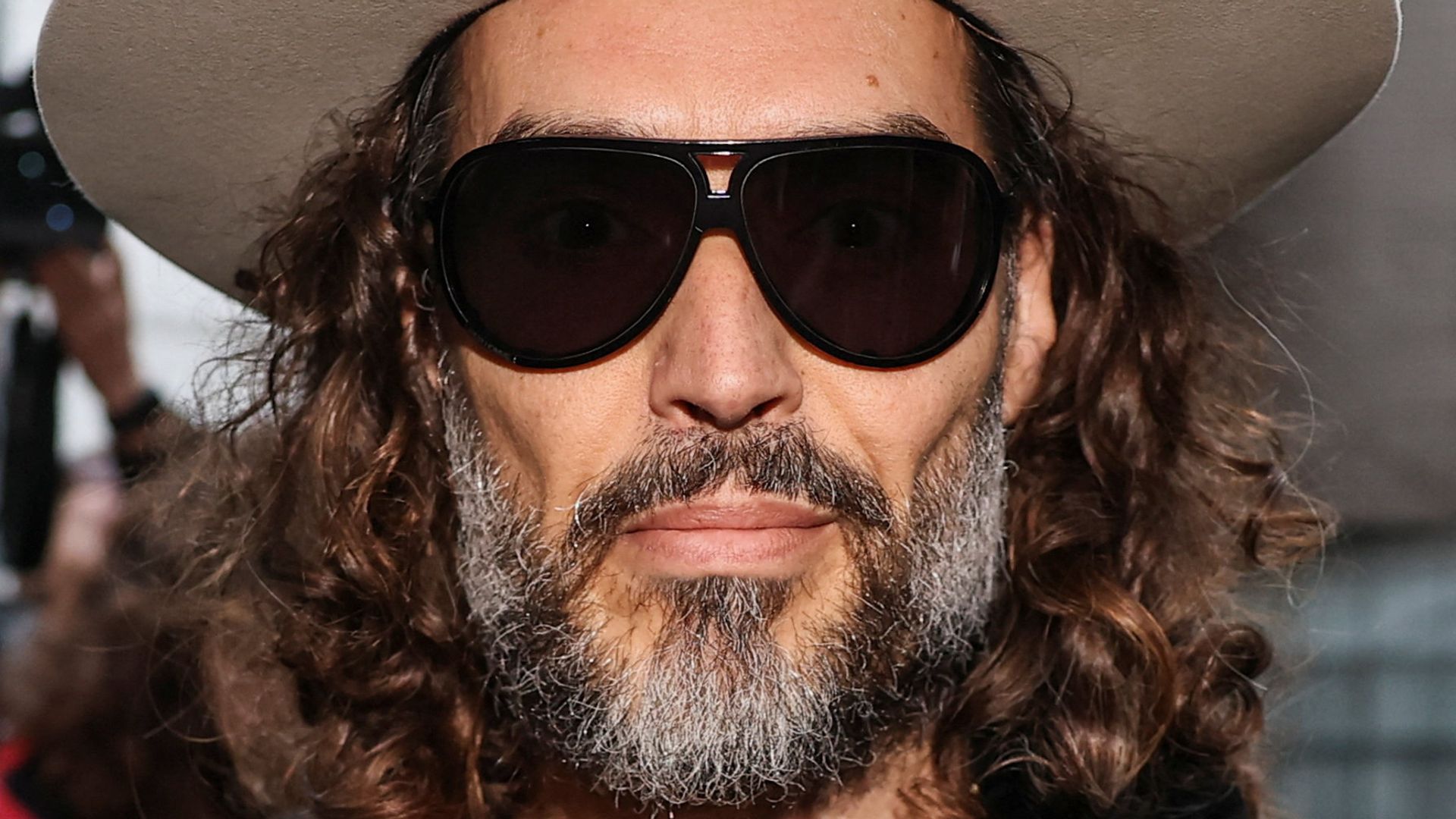 Russell Brand's rape trial delayed for six months