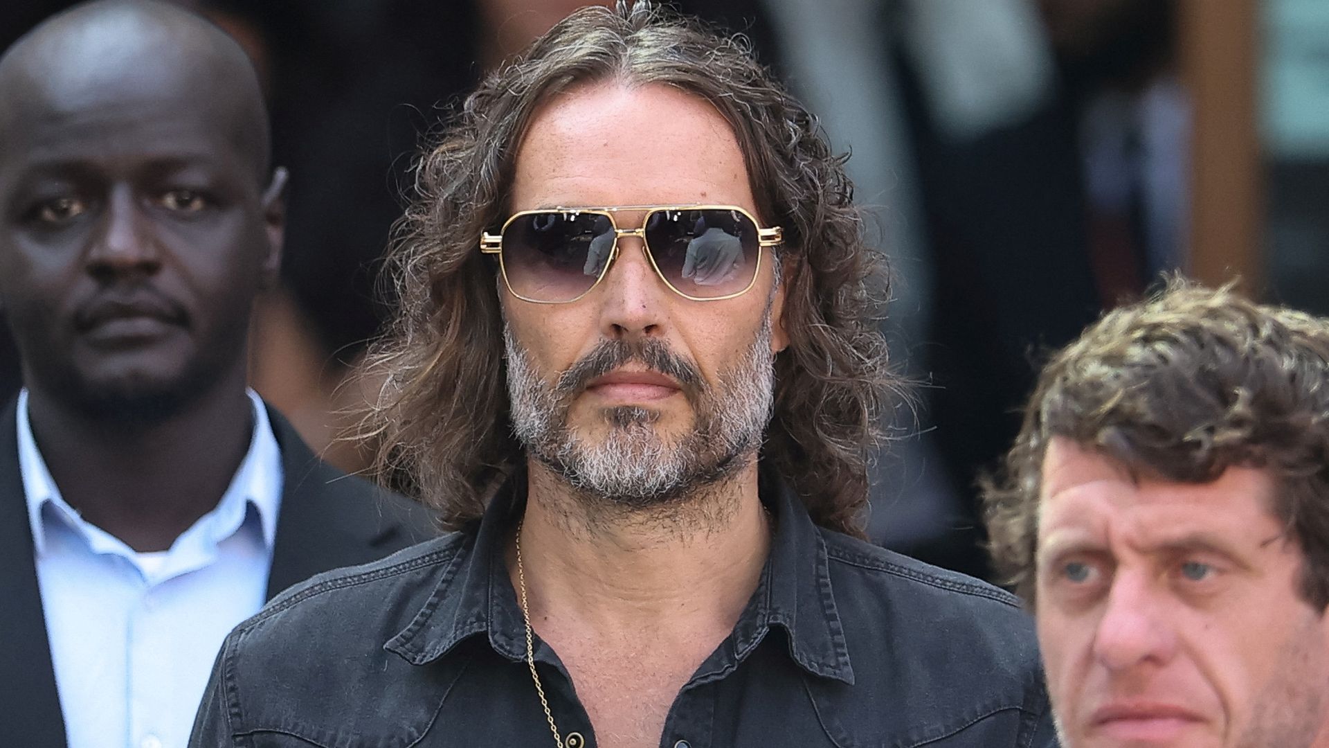 Comedian and actor Russell Brand bailed after appearing in court charged with sex offences