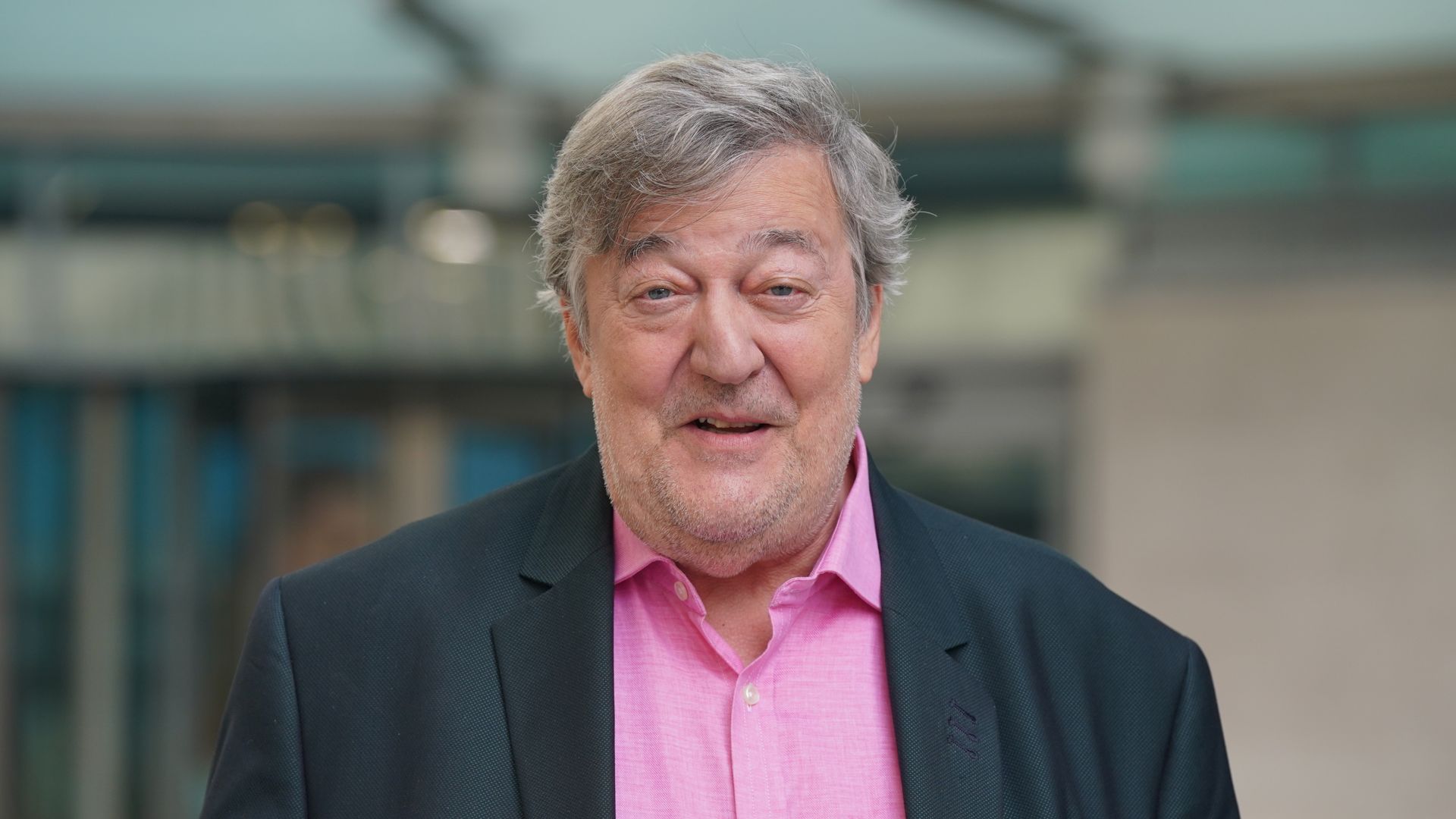Sir Stephen Fry launches £100k damages claim after 'breaking multiple bones' in fall at O2