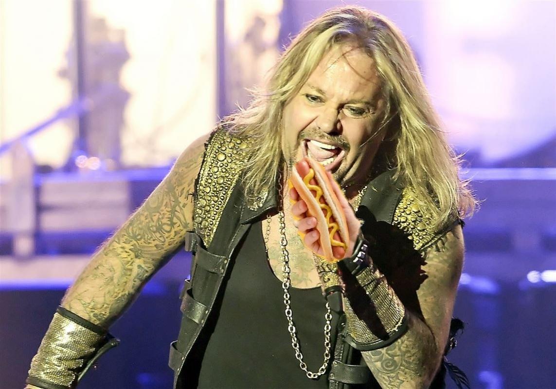 Vince Neil Steals Hot Dog From Fan