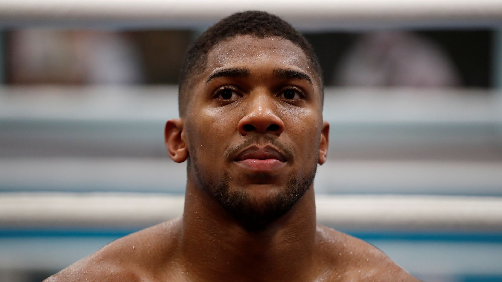 Anthony Joshua pays respects to friends killed in road crash