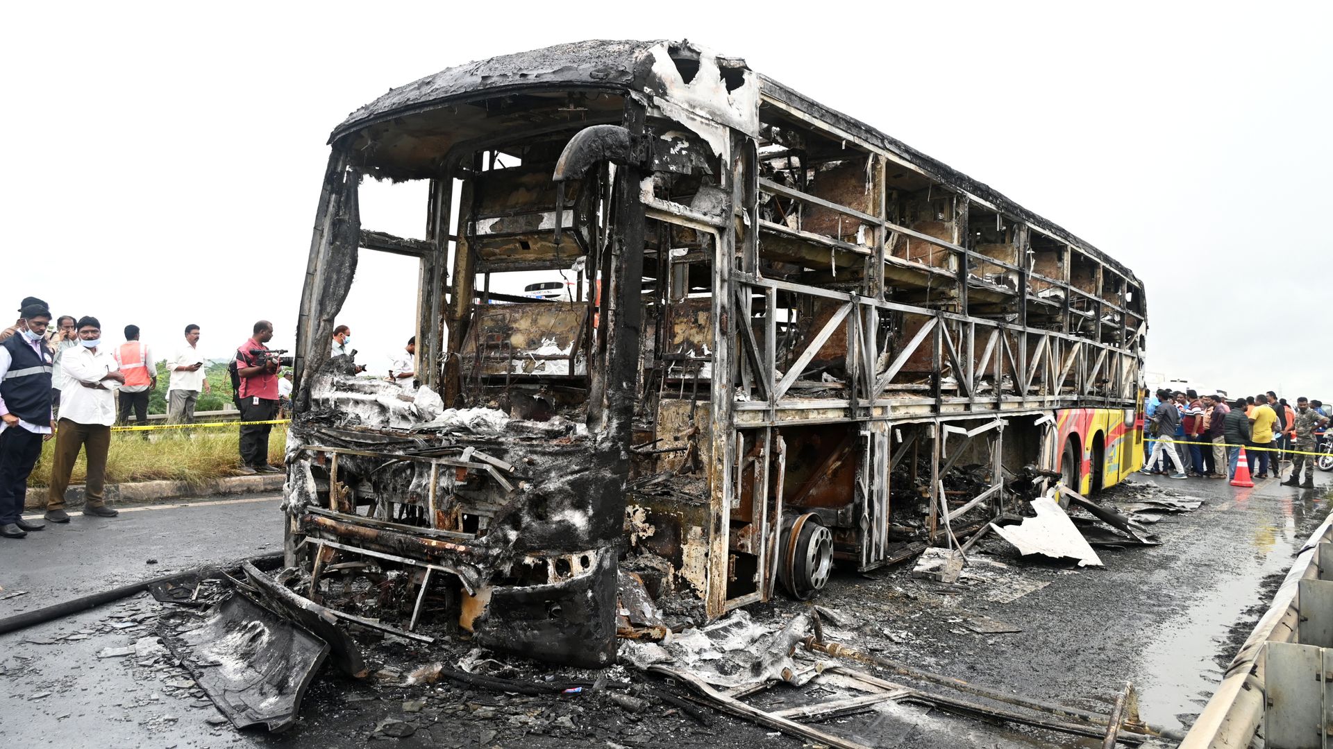 At least 25 killed as bus bursts into flames after crash in India