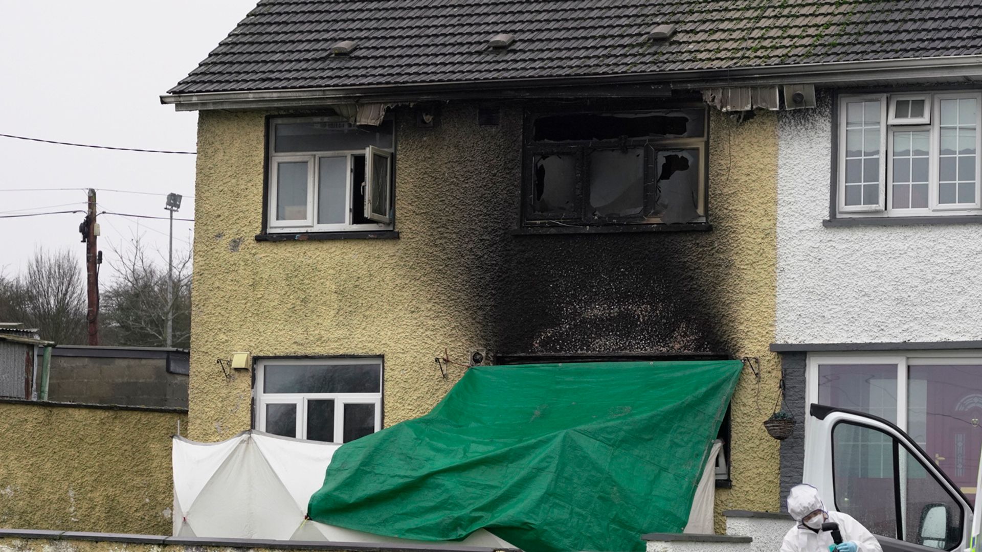 Murder investigation after woman, 60, and young boy die in house fire
