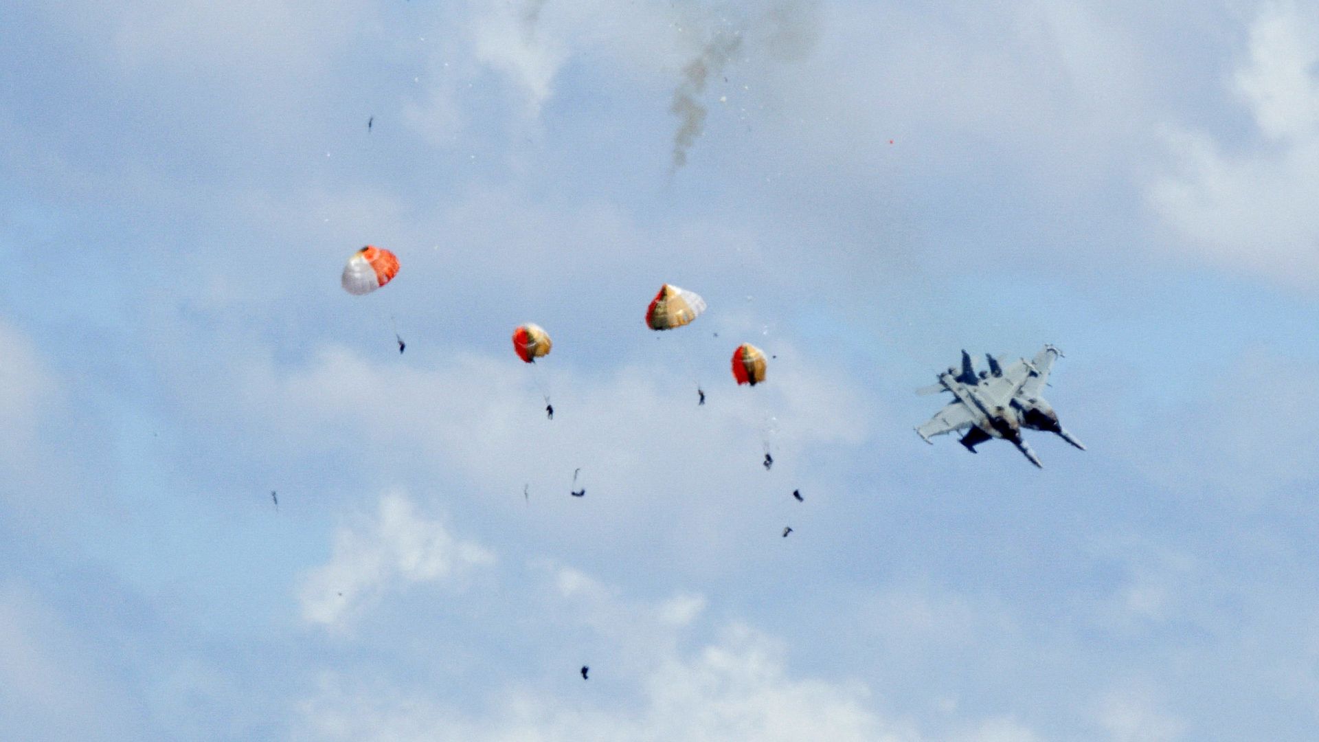 Four crew members ejected after military jets crash during US air show