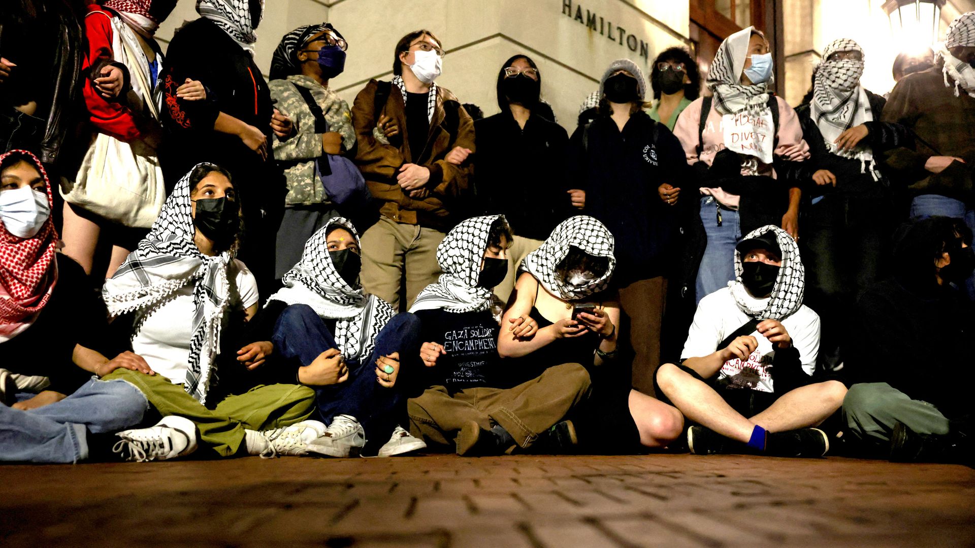 Pro-Palestinian protesters take over building at US university