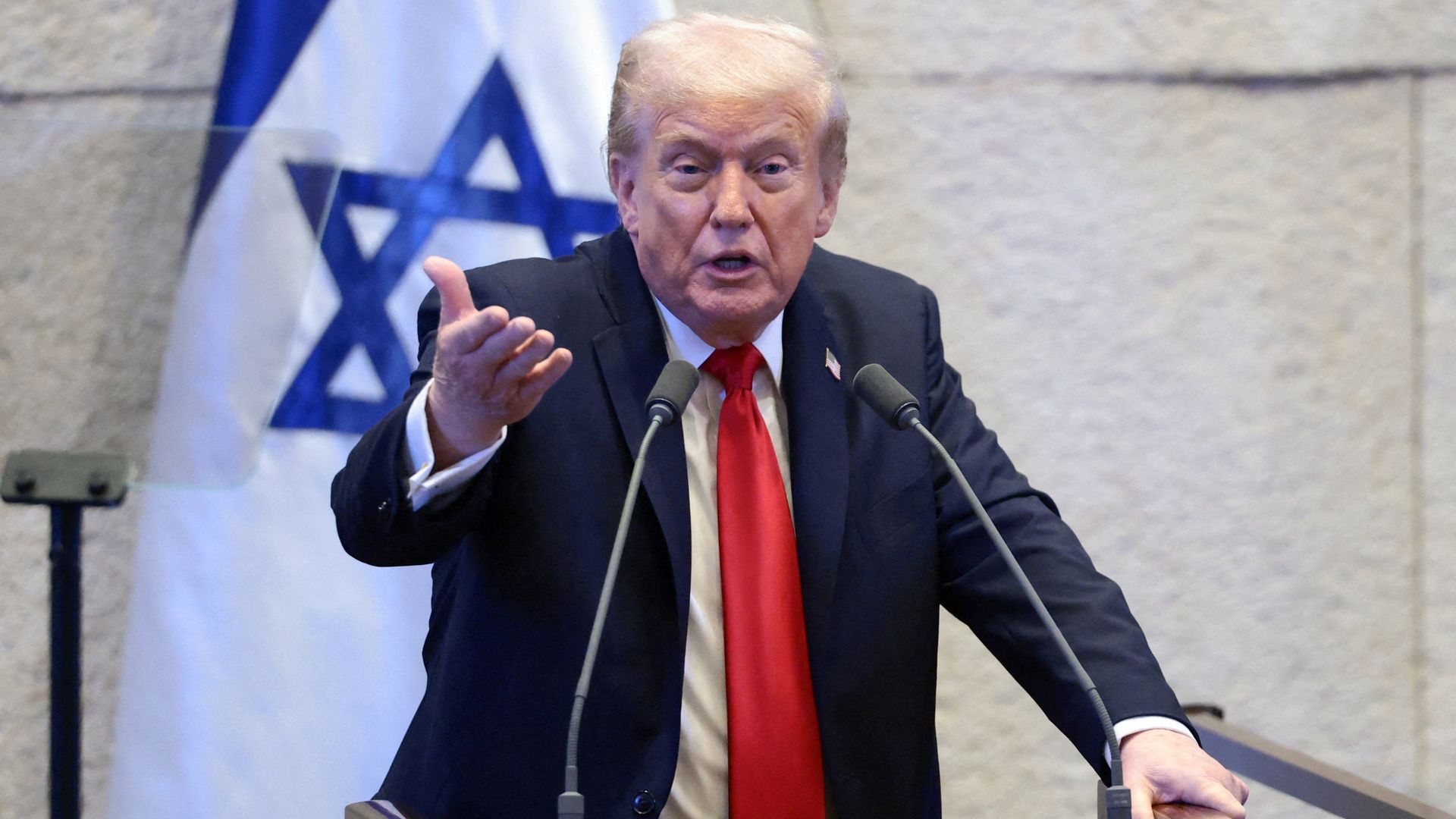 Trump heckled as he tells Israeli parliament peace deal marks 'historic dawn of a new Middle East'