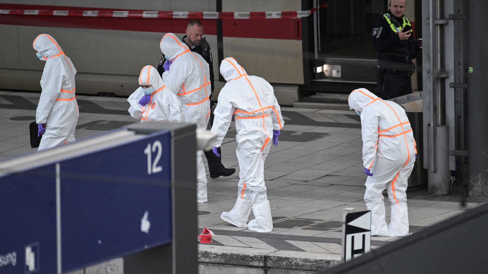 Train station stabbing in Germany leaves '17 people' injured - as woman arrested