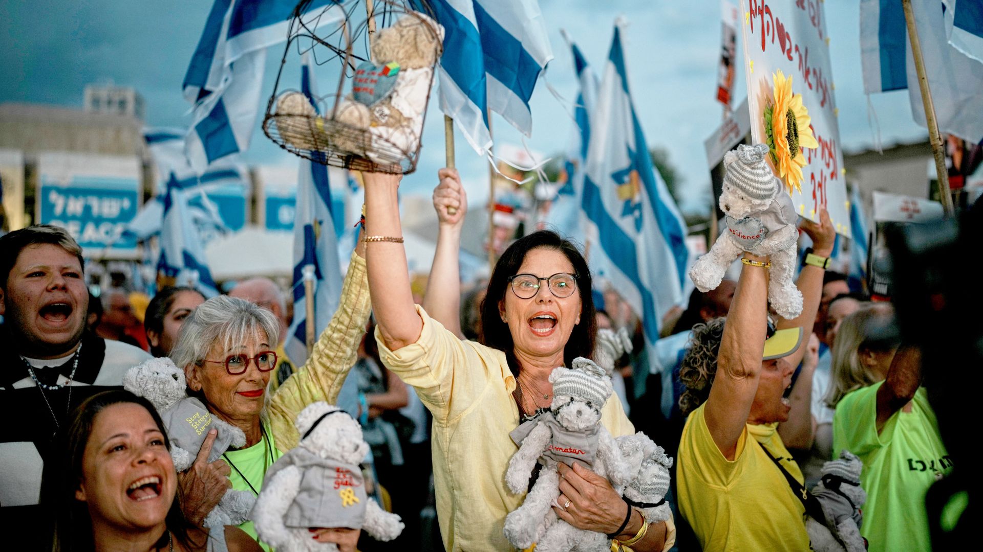 Chants of frustration turn into songs of celebration as crowds greet hostages