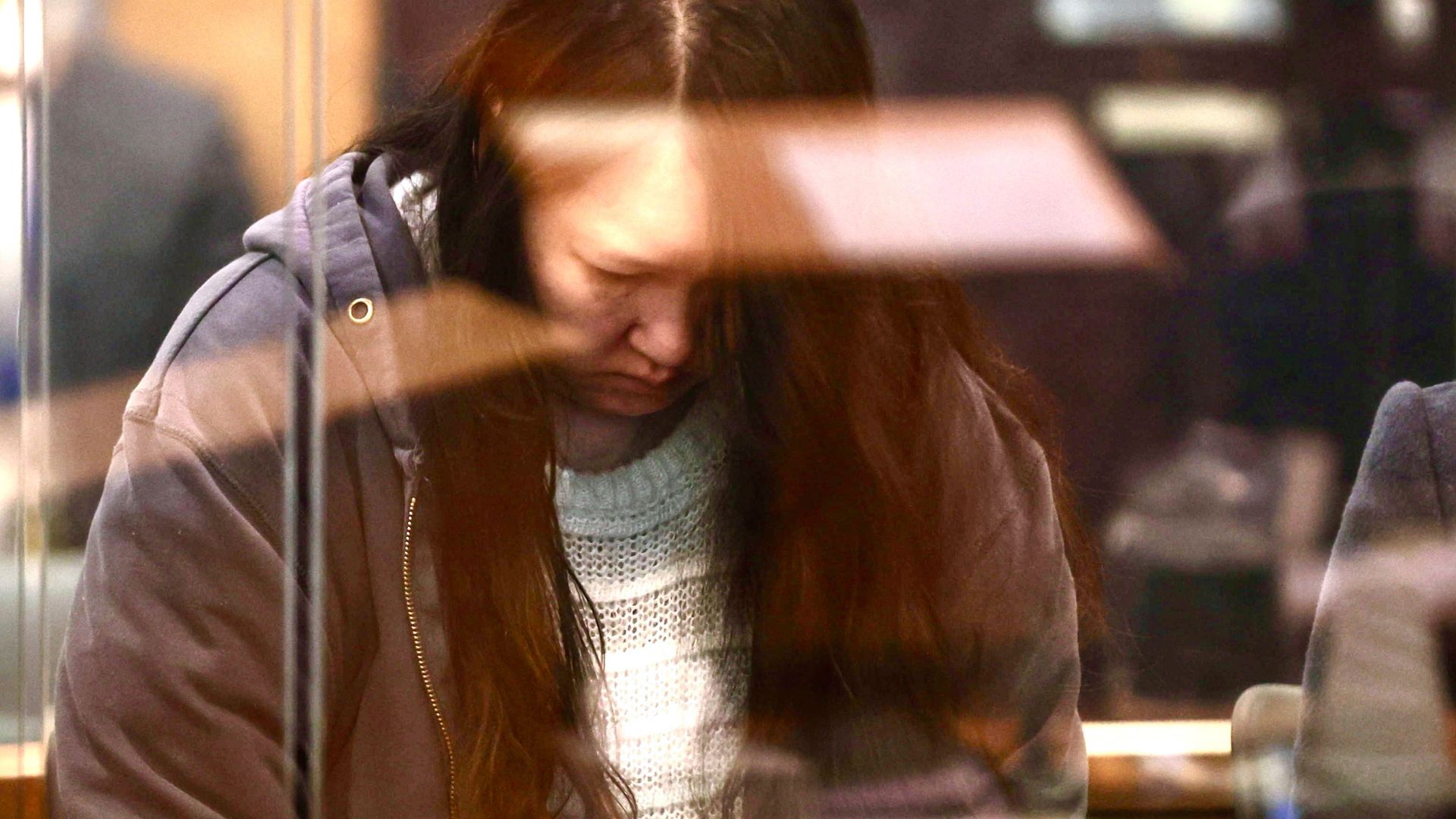 Woman jailed for life over 'suitcase murders' of her two children