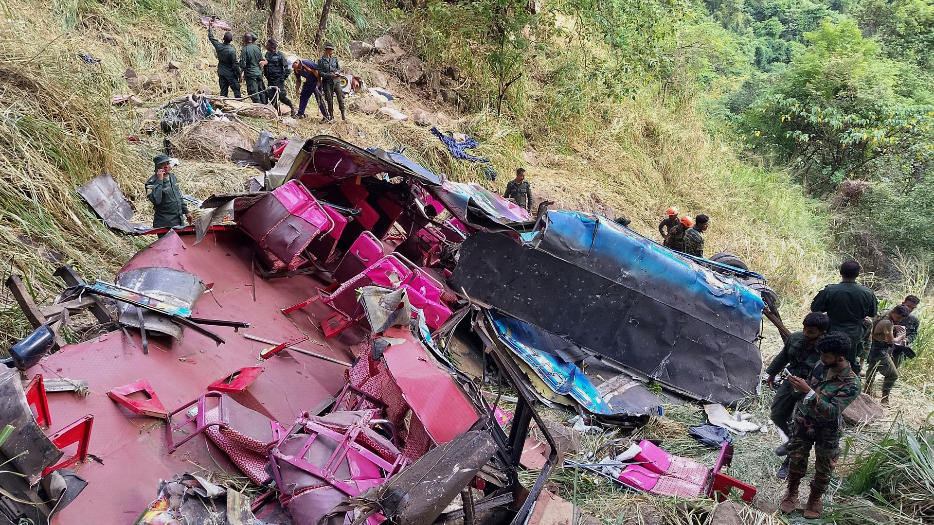 Bus crashes off 1,000ft cliff, killing 15 people