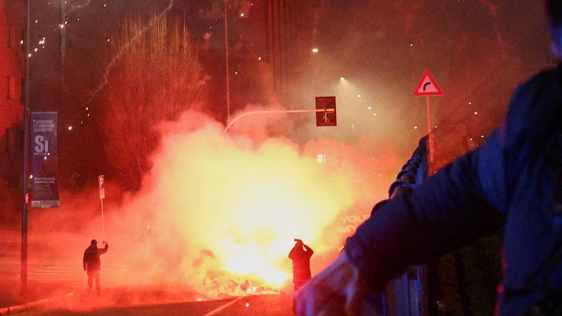 Italian police fire tear gas at protesters near Olympics venue