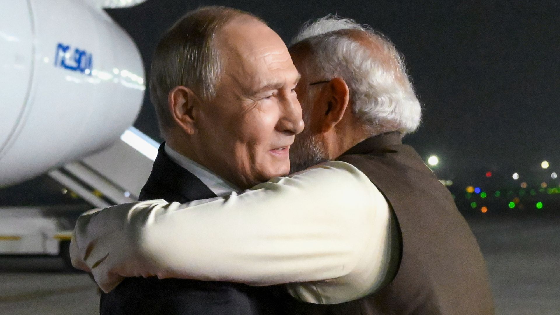 Modi and Putin embrace before talking trade at India-Russia summit