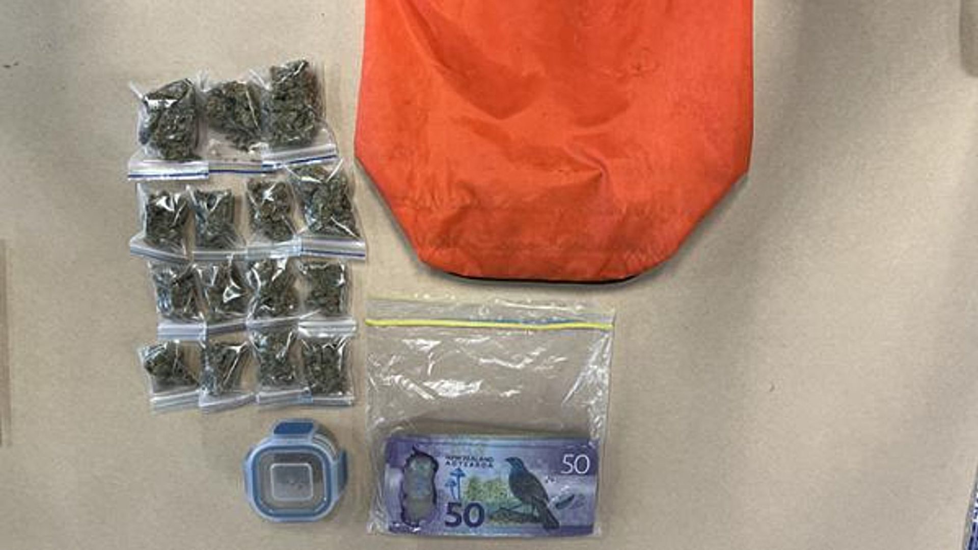 Bag containing cannabis and cash left in donation area at charity shop