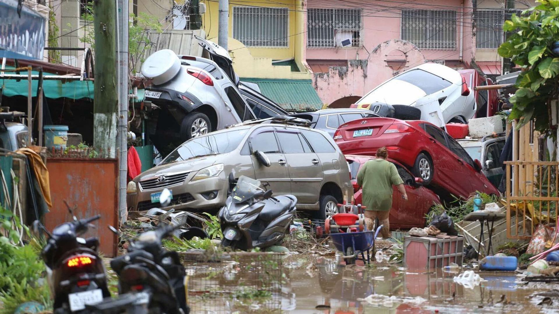 At least 26 killed after typhoon unleashes heavy rains and floods in Philippines