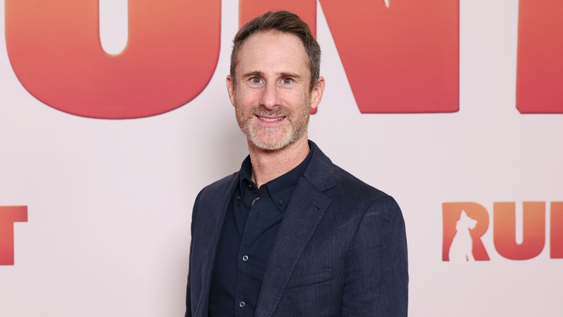 Australian author charged over child exploitation material