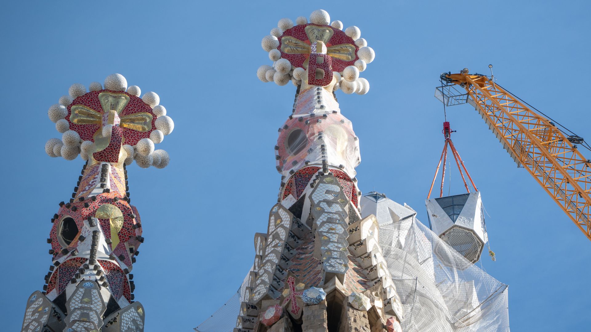 Barcelona's Sagrada Familia reaches maximum height as cross is placed on Tower of Jesus Christ