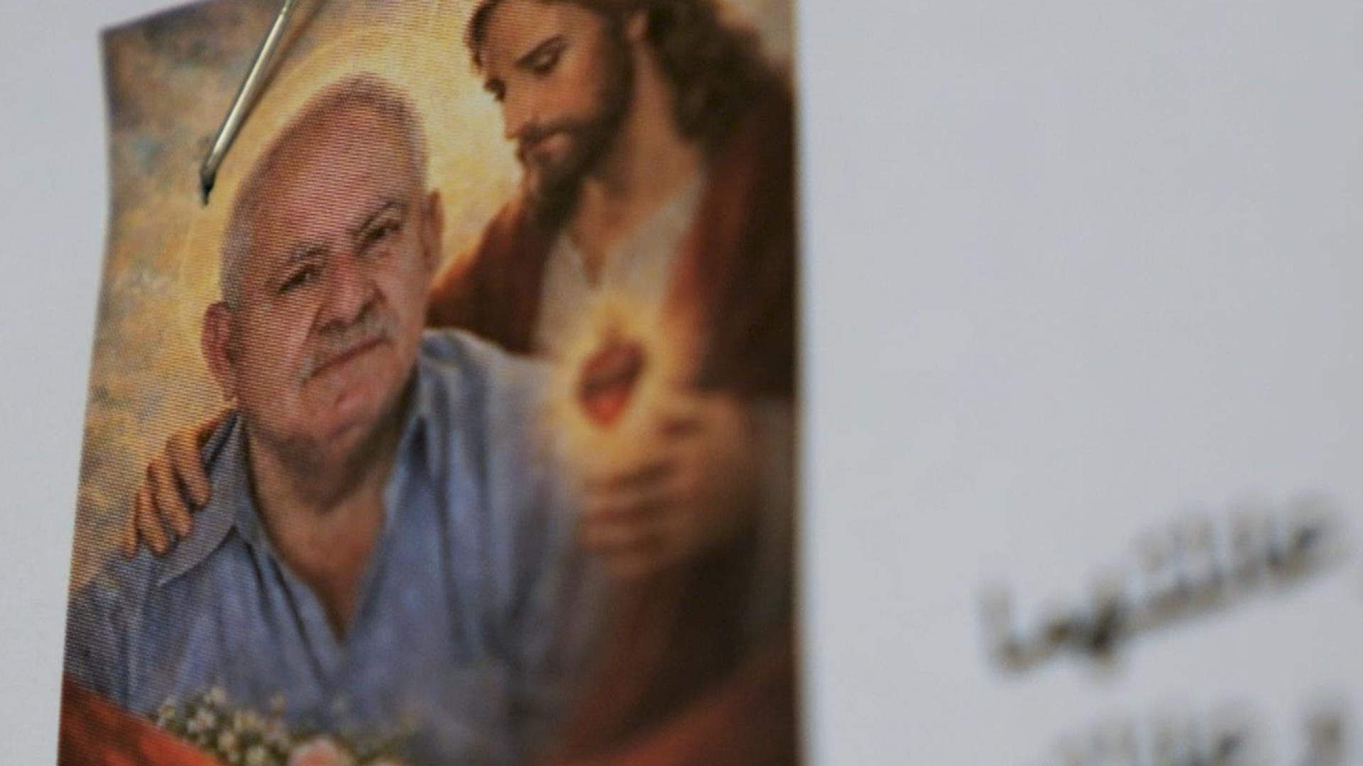 'We believe in saints, not weapons': Worshippers forced to shelter under church