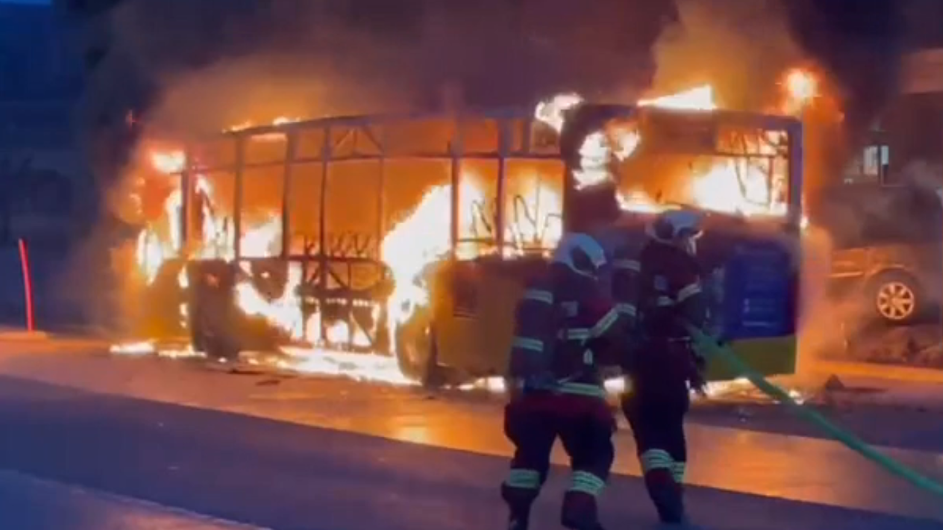 Six dead in 'deliberate' bus fire