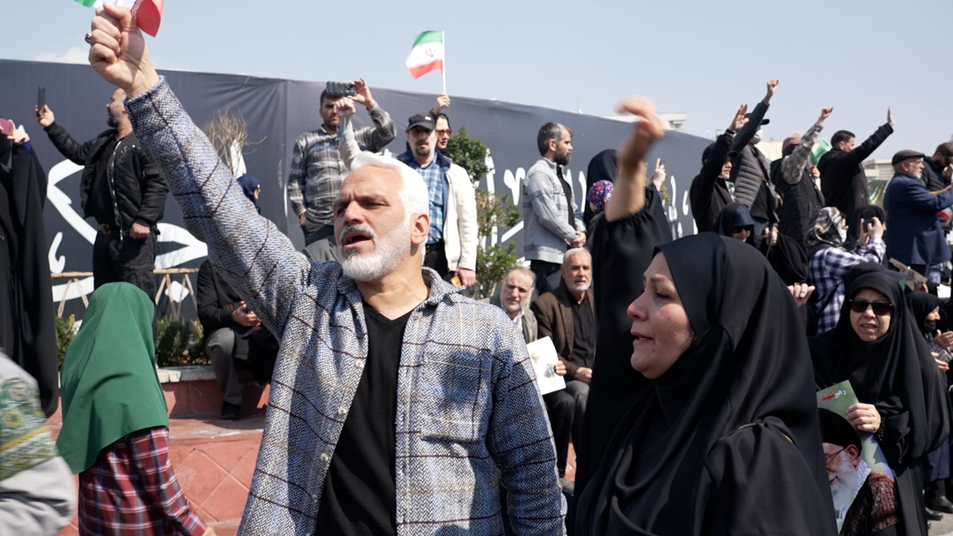 Iranians out in strength as thousands attend funeral for security chief and navy crew