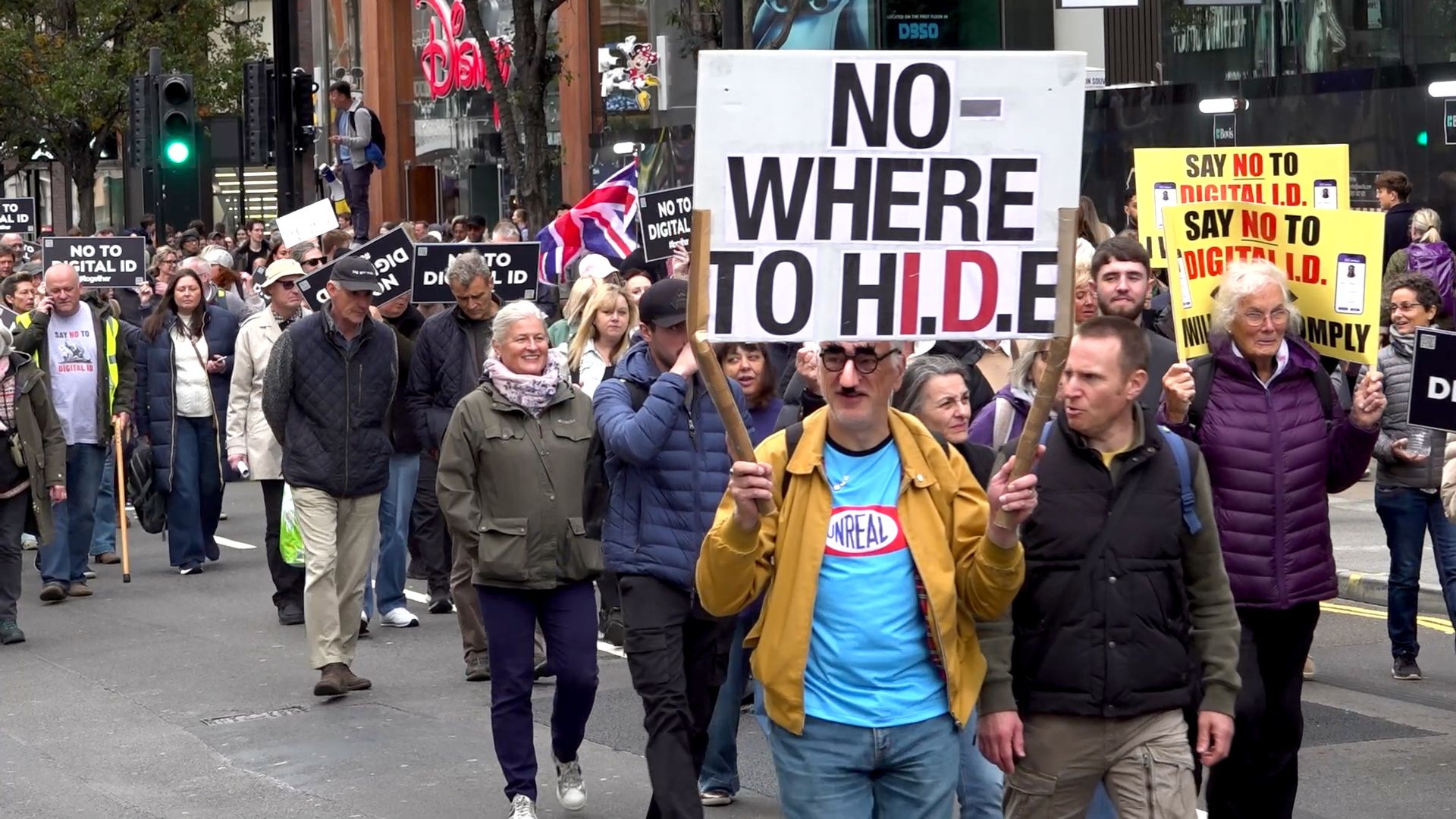 Protesters march through streets against digital ID plans
